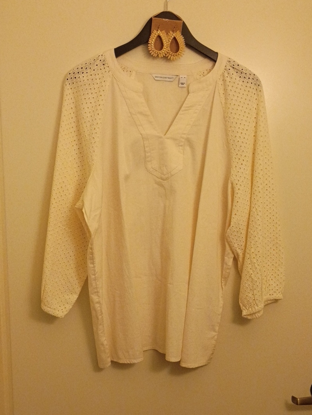 Eyelet-Sleeve Split V Tunic in Cream With Beautiful Earrings Perfect For Summer